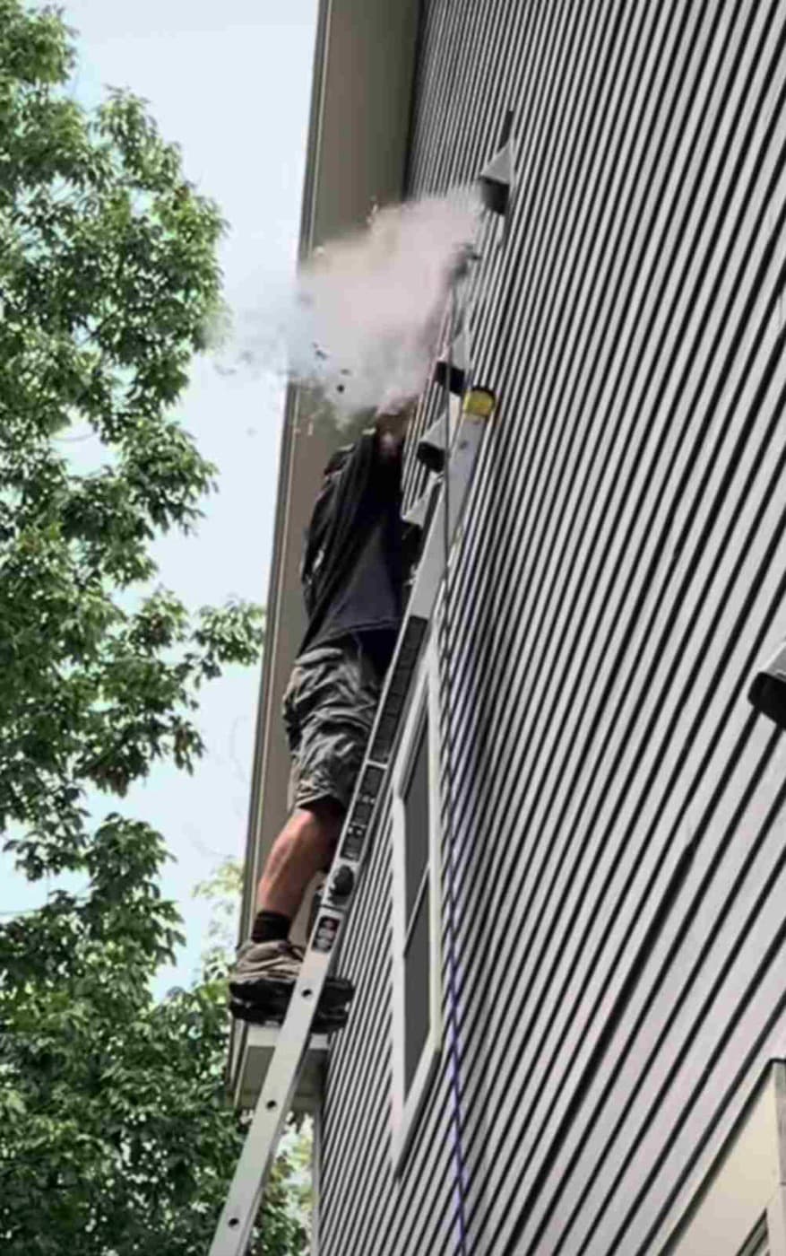A-Vent-Full technician on ladder replacing a dryer vent